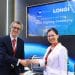 Firma del acuerdo entre LONGi Hydrogen y Vision Grid Energy.